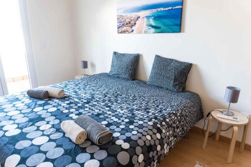 Ένα ή περισσότερα κρεβάτια σε δωμάτιο στο Apartments Baleal: Sunshine by the Pool
