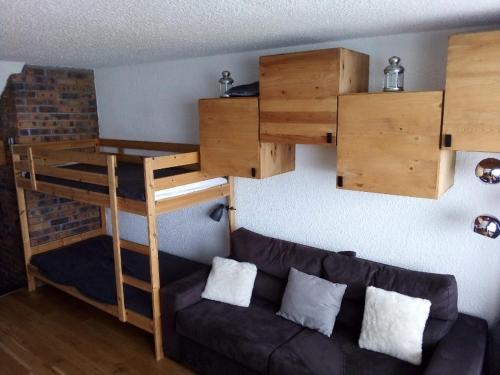 Ένα ή περισσότερα κρεβάτια σε δωμάτιο στο Studio cosy entrée les Evons Résidence Le BRELIN