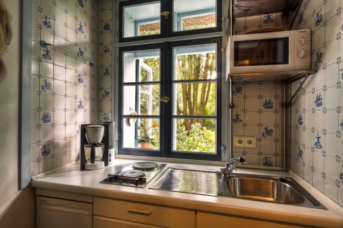 Dapur atau dapur kecil di Ferienhof tom Diek