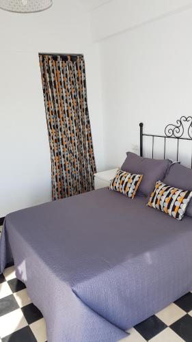 Postel nebo postele na pokoji v ubytování Apartamento centro histórico Arcos