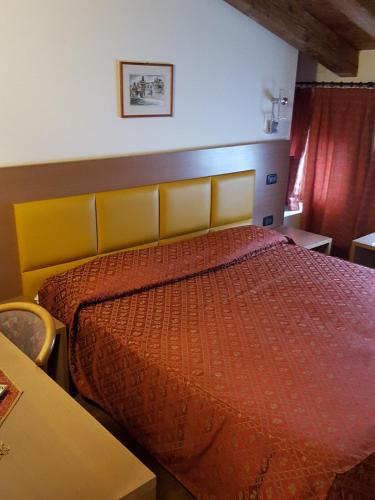 Hotel and Wellness Patriarcaにあるベッド