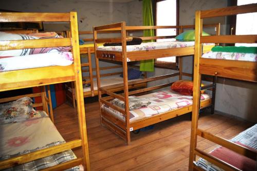 a room with a bunch of bunk beds at Hikers Hostel in Plovdiv
