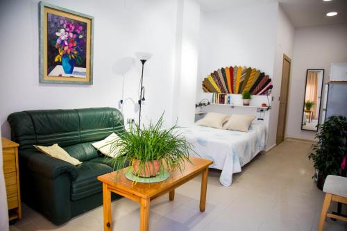 Posteľ alebo postele v izbe v ubytovaní Apartamentos RISCOS