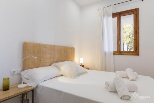 Postel nebo postele na pokoji v ubytování Can Sovis