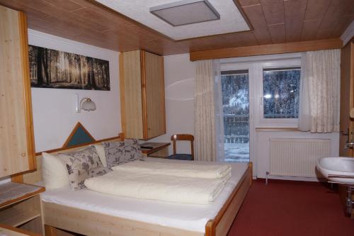 En eller flere senger på et rom på Apart Garni Dorfblick