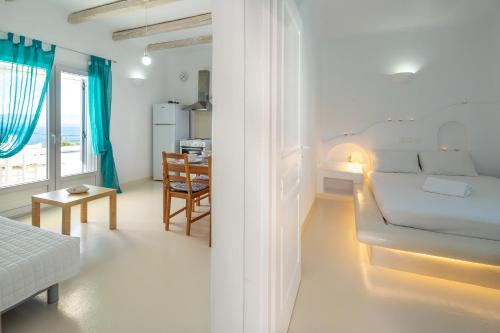 Posteľ alebo postele v izbe v ubytovaní Karystos Villas
