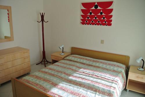 A bed or beds in a room at Condominio BILLA