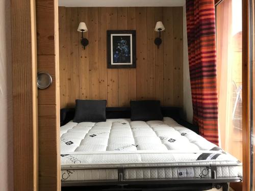 Ένα ή περισσότερα κρεβάτια σε δωμάτιο στο RESIDENCE ANTARES 4*