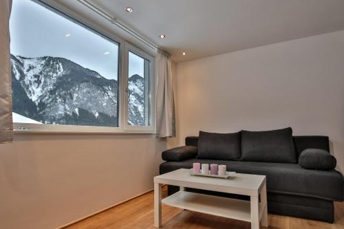 Nespecifikovaný výhled na hory nebo výhled na hory při pohledu z apartmánu