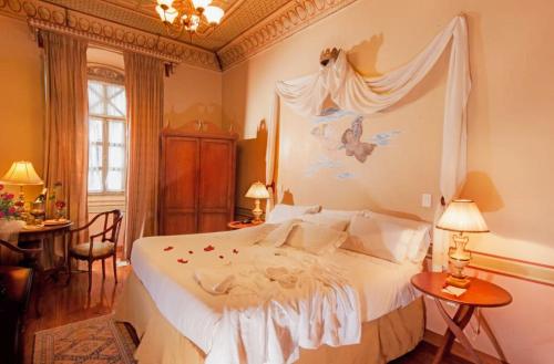 Letto o letti in una camera di Hotel Carvallo