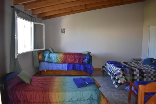 A bed or beds in a room at Del Alto-Viviendas turisticas