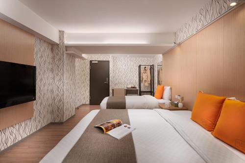 Postel nebo postele na pokoji v ubytování Click Hotel - Taipei Main Station Branch