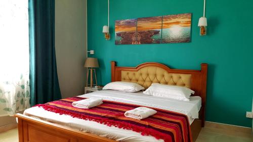 Postel nebo postele na pokoji v ubytování Krishangel Beach Apartment