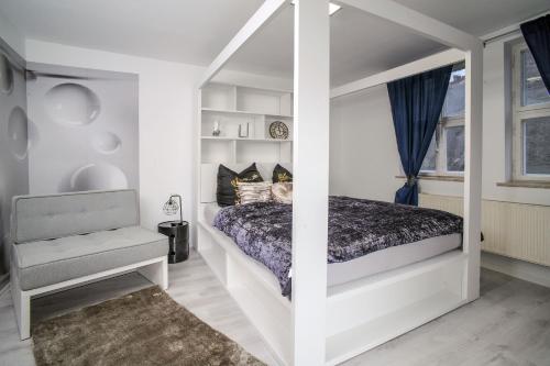 Postel nebo postele na pokoji v ubytování Designpension Traumschloss Hotel Garni