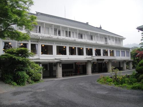 a large white building with a lot of windows at Nikko Kanaya Hotel in Nikko