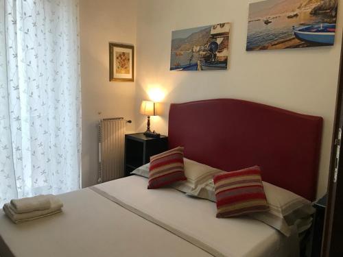 Postel nebo postele na pokoji v ubytování affittacamere sereno