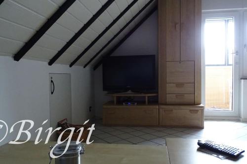 Μια τηλεόραση ή/και κέντρο ψυχαγωγίας στο Gästehaus Streich Refrath, Bergisch Gladbach