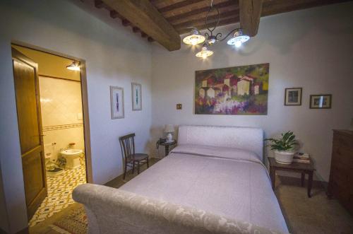 Un pat sau paturi într-o cameră la Villa Scianellone