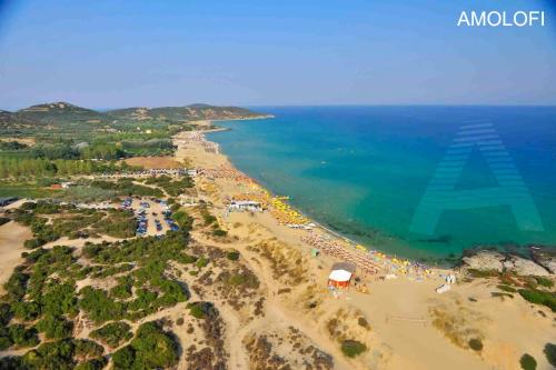 an aerial view of a beach with a group of people at Central Number 10 in Néa Péramos