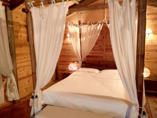 Katil atau katil-katil dalam bilik di Hotel Sierra Oriente