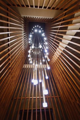 a room with a bunch of lights in the ceiling at Barhat Hotel & SPA in Taraz