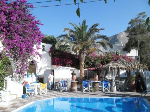 a view of the pool at the hotel at Villa Markos in Perissa