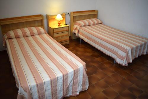 Llit o llits en una habitació de Villa Salitre