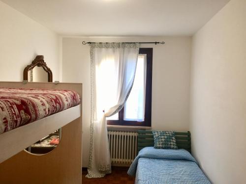 Krevet ili kreveti u jedinici u okviru objekta Appartamento Casa della Nonna