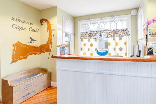 a bar in a kitchen with a counter at HI Hyannis Hostel in Hyannis