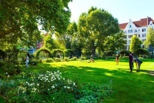 Zahrada ubytování Pension Peters – Das andere Hotel