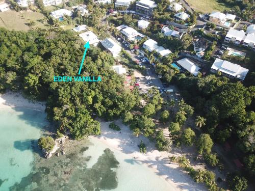an aerial view of an island with a resort at La plage de Petit-Havre in Le Gosier