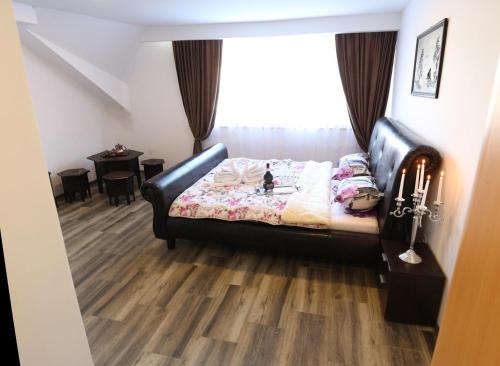 מיטה או מיטות בחדר ב-Pansion Neretva