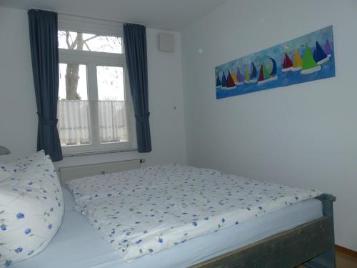 Postel nebo postele na pokoji v ubytování Landhaus am Haff