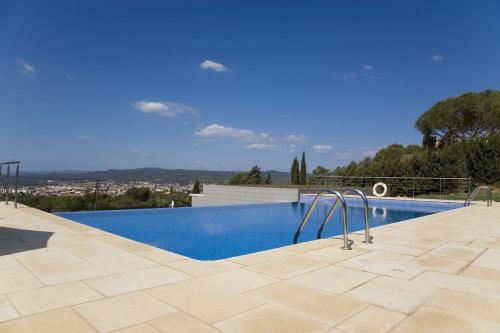a swimming pool in a villa at Mas Ses Vinyes - Adults Only in Begur