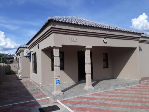 a small building with at Eros Guest Inn in Francistown