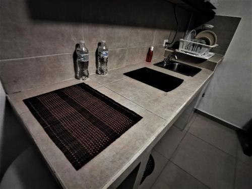 Una cocina o cocineta en Mi Depa Tec 25