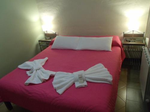 Cama ou camas em um quarto em Munay Humahuaca