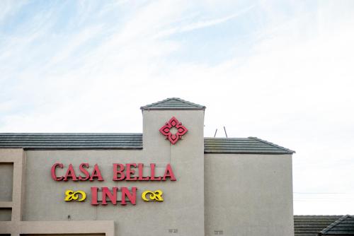 a building with a casa ballilla sign on it at Casa Bella Inn- Huntington Park in Huntington Park