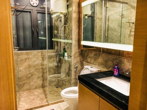 Ένα μπάνιο στο RnF Princess Cove Luxurious Condo