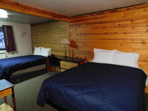 Postel nebo postele na pokoji v ubytování Packwood Inn