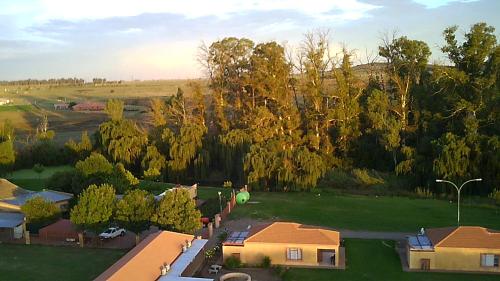 an aerial view of a house in a field at Nations Lodge in Lynchfield