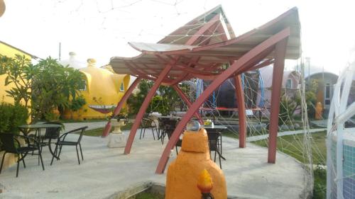 a fire hydrant is standing in front of a patio at Kenting Ha-Bi Star Fort in Hengchun