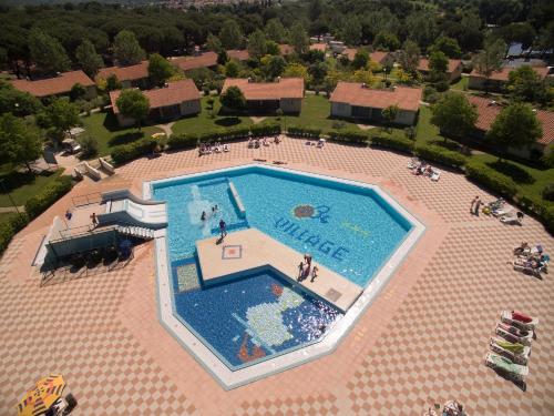 an overhead view of a large swimming pool at Albatross Mobile Homes on Camping Bi Village in Fažana