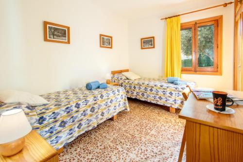 Postel nebo postele na pokoji v ubytování Chalet Joan i Nuria By homevillas360