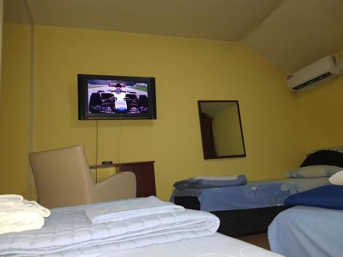 Een bed of bedden in een kamer bij Motel Magistrala
