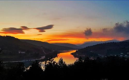 a view of a river at sunset at TAŞ KONAK BUTİK OTEL in Ordu