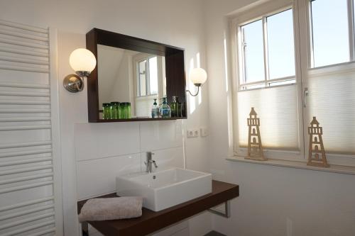 Ένα μπάνιο στο Ferienhaus „Lachmöwe“ Zierow