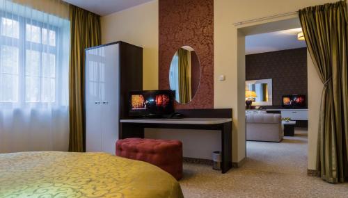 Postel nebo postele na pokoji v ubytování Hotel Zamek Gniew