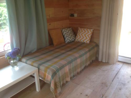 Postel nebo postele na pokoji v ubytování hygge hut