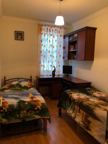 Postel nebo postele na pokoji v ubytování Rest home Jermuk